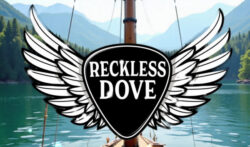 Reckless Dove logo with mountains and a sailboat mast in the background